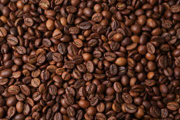 Aromatic coffee beans as background, top view