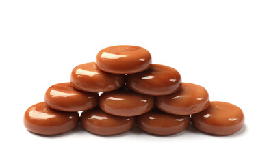 Tasty sweet caramel candies isolated on white