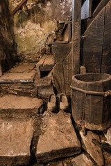 Traditional wooden clogs in a rural corner