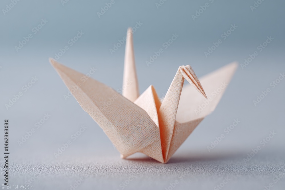 Poster minimalistic setup focusing on artfully folded origami crane with ample copy space around it
