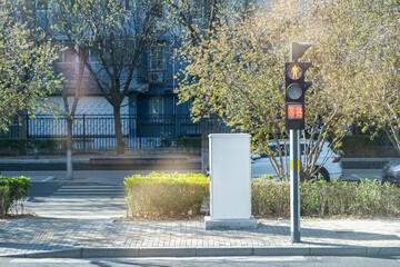 Pedestrian red light traffic signal in a street crossing in China, digital countdown timer and message in chinese
