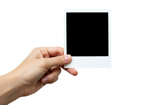 hand holding blank photo frame, A hand holds a polaroid picture isolated on transparent background 