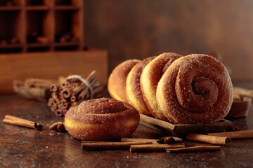 Swedish cinnamon rolls on a brown background.