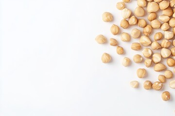 Light beige chickpeas scattered on white background.  Small, whole, and round legumes, slightly off-white.  A  high-angle close-up shot, perfect for ingredient showcasing