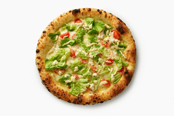 Caesar salad pizza with romaine lettuce and cherry tomatoes on white background