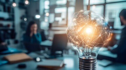 Conceptual image of a glowing lightbulb in a modern office setting.