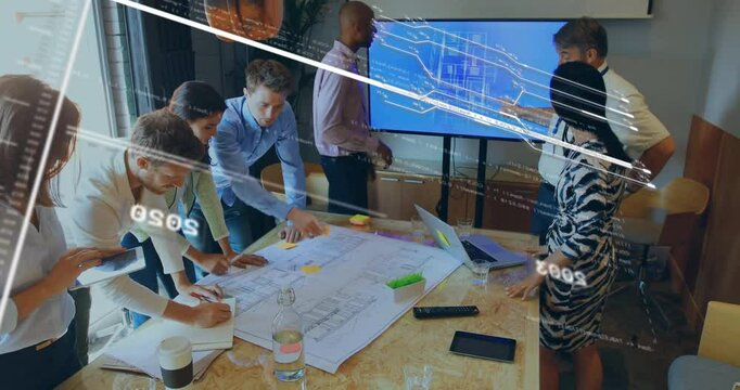 Engineering team collaborating around table with blueprint, overlaying floating circuit diagrams