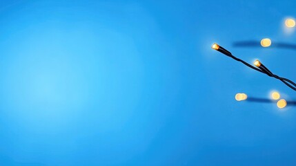 Small warm lights against a vivid backdrop.