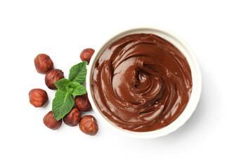 Chocolate hazelnut spread in bowl, nuts and mint isolated on white, top view