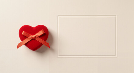 Red Heart-Shaped Gift Box with Ribbon on Neutral Background  