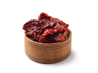 Delicious sun dried tomatoes in bowl isolated on white