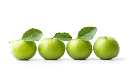 Obraz premium A group of fresh green plums with a leaf, isolated against a white background