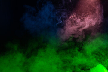 Blue and pink steam on a black background.