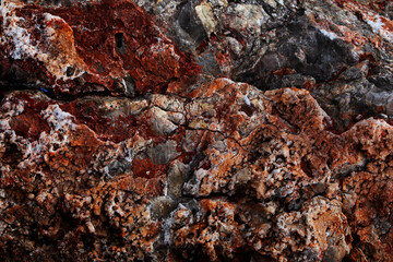 Colored stones with salt on the seashore