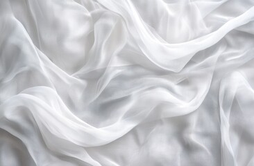 Obraz premium Smooth, flowing white fabric drapes in soft folds. A delicate, sheer texture is visible