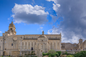 Townscape of Gravina in Puglia in Apulia region, Italy: view of Cathedral of Holy Mary Assumption from gravine.