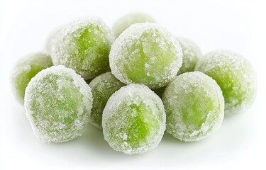 Frozen green grapes covered in ice crystals.  A cluster of small, round, light-green grapes, completely encased in a layer of frost