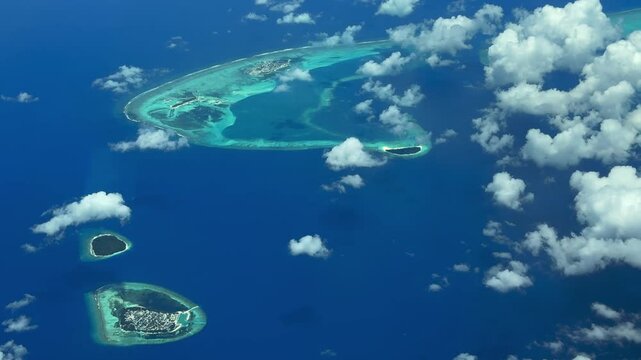 4k Aerial video footage, flying along the Island of Hithaadhoo as well as Finolhu, Thulhaadhoo and Maagandu . The Atoll with lagoon and islands is located on the Baa Atoll, Maldives in Indian Ocean.