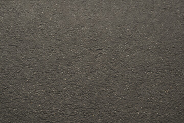 Obraz premium A close-up view of a textured surface showcasing a dark and subtle pattern