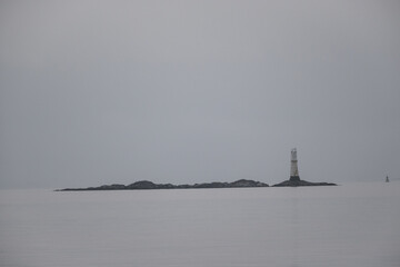 The Gantocks, Navigation Beacon in the Firth of Clyde Scotland viewed from Dunoon on a grey wet rainy stormy day. nautical assistance for bad weather