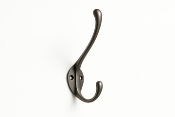 A sleek, modern wall hook made from durable metal. Its elegant design complements any interior decor, adding functionality and style to homes or offices for hanging coats and bags.