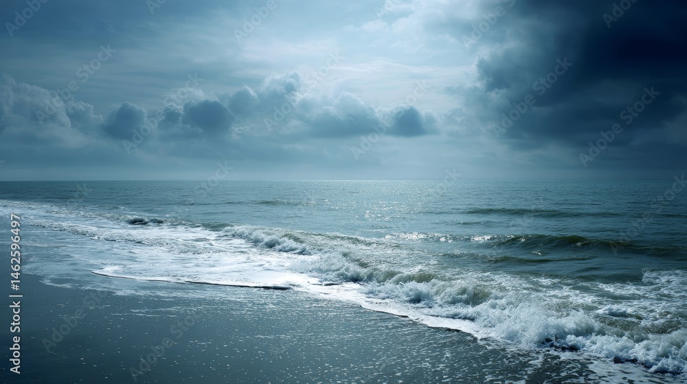 Aufkleber Waves crash onto the shore as sunlight breaks through dramatic clouds, creating a captivating display of nature's power at twilight on the coast