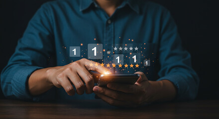Man using smartphone with digital star rating feedback and satisfaction review interface overlay real estate business ,technology ,selling ,purchasing ,agreement