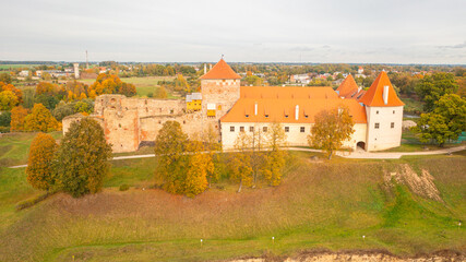 Aerial photo from drone to Bauska Castle on a beautiful autumn day. Bauska, Latvia. (Series)
