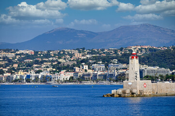 Lighthouse and Nice town cityscape, France