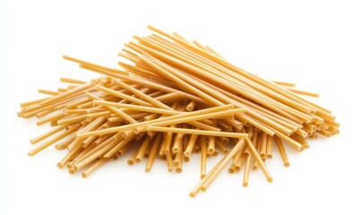 Pile of light golden, thin, hollow pasta tubes,  close-up on white background