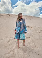 Fashion shooting in stylish clothes in the desert.