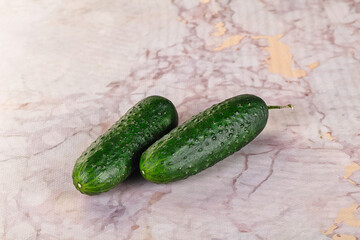 Ripe green raw two cucumbers