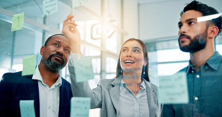 Collaboration, glass wall and ideas with business people in office for brainstorming or strategy. Conversation, planning or sticky notes with employee team in corporate workplace for development