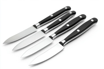 Fototapeta premium knives elegantly arranged with black and white handles on a wooden cutting board.