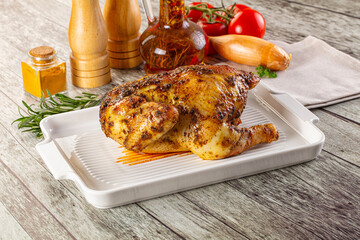 Baked in oven whole chicken with spices