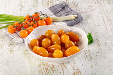 Marinated yellow cherry tomatoes heap