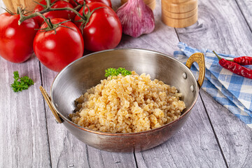 Vegan cuisine - boiled bulgur garnish