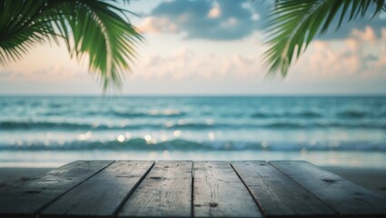 Bare wooden table with a blurred ocean and sky backdrop