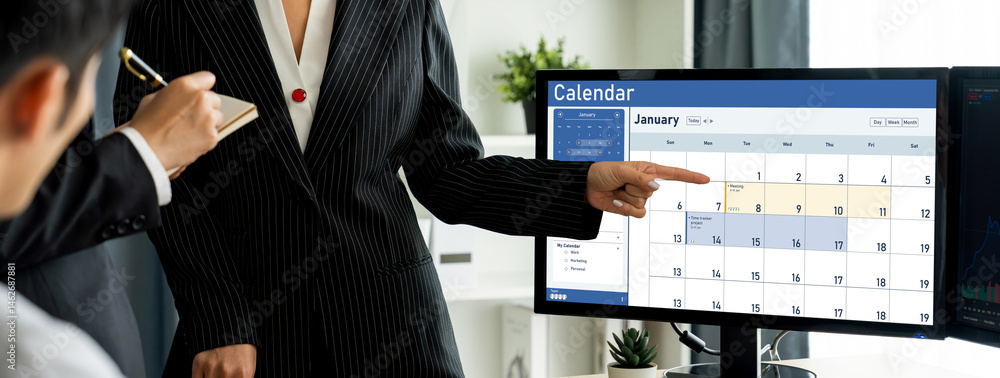 Poster calendar on computer software application for schedule planning for personal organizer and online bu