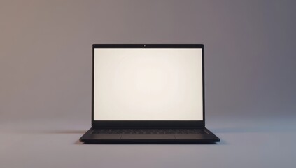 A black laptop computer, front view, with blank screen, sits on a plain neutral background