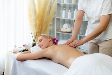 Caucasian woman customer enjoying relaxing anti-stress spa massage and pampering with beauty skin...