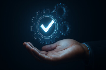 Business Hand Holding Gear with Check Mark – Quality Assurance and Workflow Concept

