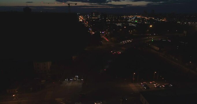 Rolling blackout in a big city in the evening.