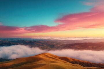 Naklejka premium Vibrant sunset over rolling hills and valleys with colorful clouds and mist