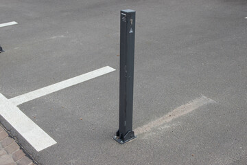 Foldable parking space bollard with lock.