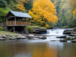 Obraz premium Autumnal waterfall scene with wooden gazebo