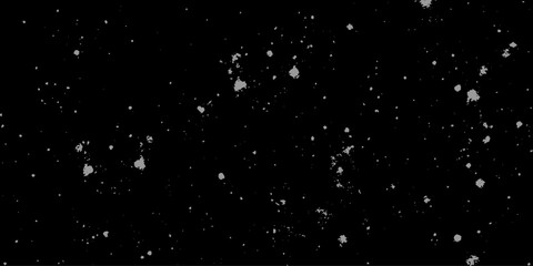 Abstract grunge background featuring a rough, dusty, and aged surface. The texture includes distressed paint, scratches, noise, and grain effects across a monochrome palette of black, grey, and white.