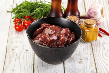Raw chicken liver uncooked in the bowl