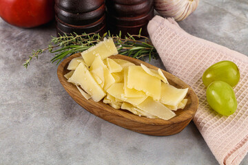 Parmesan cheese slices in the bowl