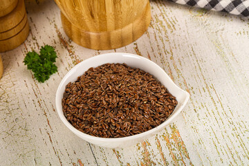 Brown flax seeds in the bowl